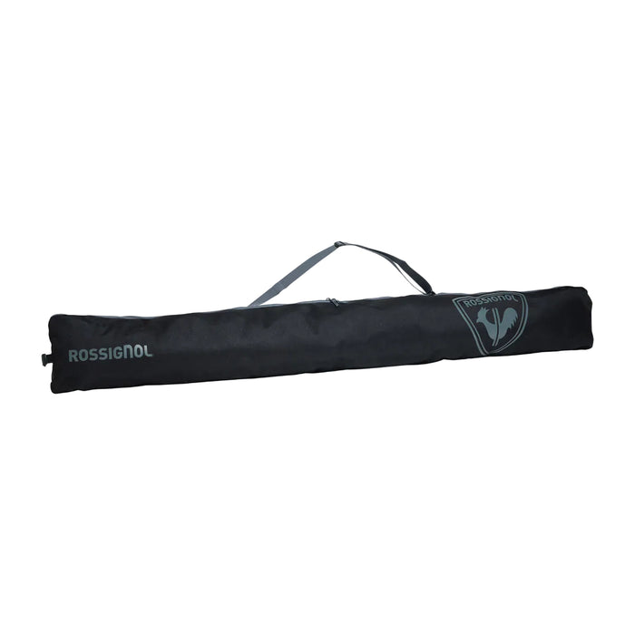Long rectangular black object on a white background
