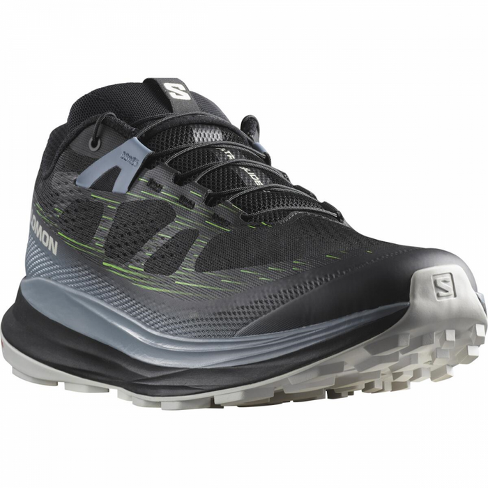 Black and gray running shoe with visible brand logo on a white background